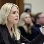 Pam Bondi Caught Flipping Through ‘Burn Book’ During Explosive House Hearing
